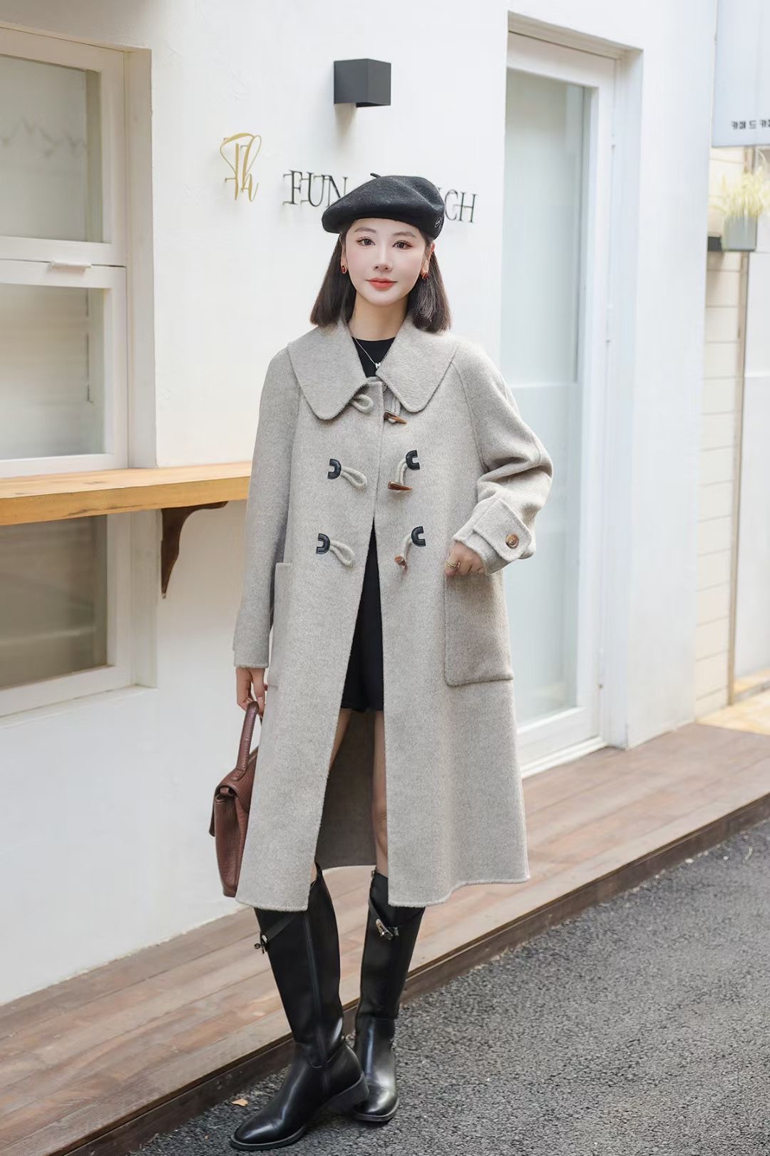 娃娃领双面羊绒大衣女2024年新款高级感洋气长款牛角扣双面呢外套